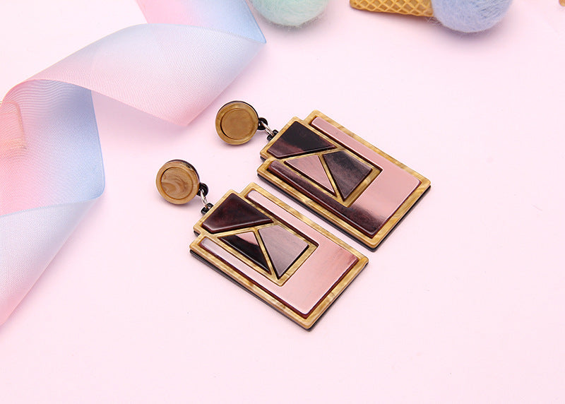 3D geometric patch earrings dark and light color options