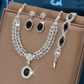 Luxury four-piece jewelry set with matching necklace and earrings