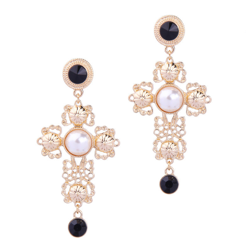 Stylish women’s alloy cross earrings close-up