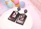 Women’s rhombus-shaped acrylic statement earrings