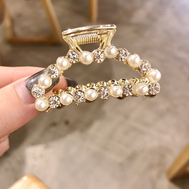Classic pearl hair accessory offering comfort, durability, and shine.