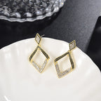 Elegant modern diamond earrings close-up view