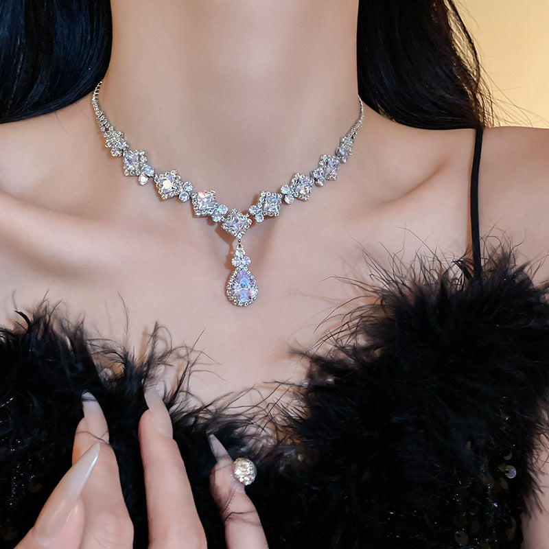 Elegant silver zircon necklace and earrings set