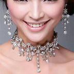 white bridal necklace and earrings set for wedding dress